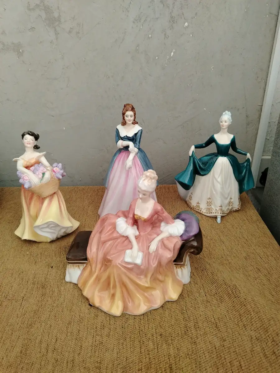 4 Royal Doulton figurines, The One Is Little cracked.