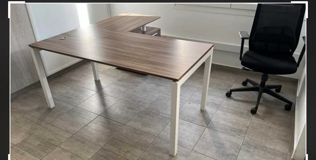 L-shaped office desk with chair